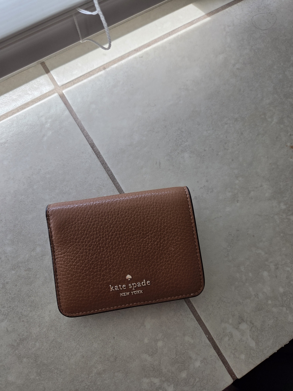 kate spade Pebble Leather Bifold Card Wallet in Brown